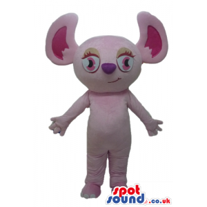 Purple koala with big pink ears and pink eyes with brown