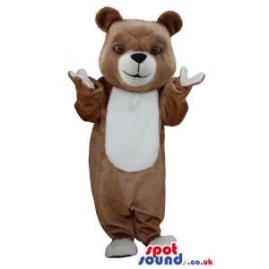 Brown-white teddy mascot with tilted head and waving his hand -