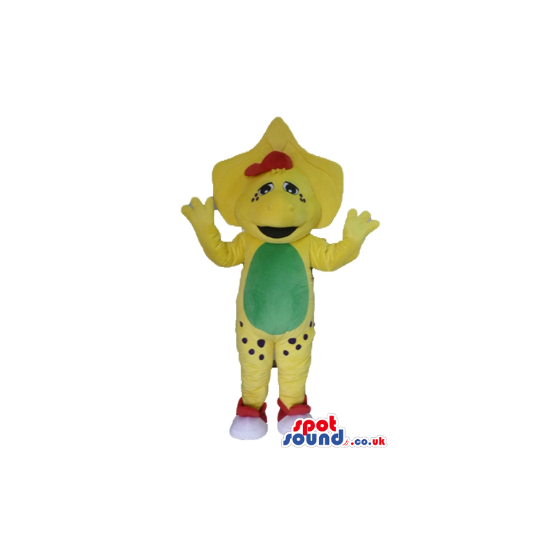 Yellow monster with a green belly, a red bow and white and red