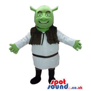 Green ogre wearing a white tunic and a brown furry vest and