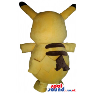 Yellow monster with long and thing yellow and black ears, red