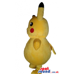 Yellow monster with long and thing yellow and black ears, red