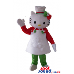 Hello kitty wearing a white chef's hat with red and green