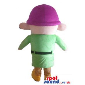 Young dwarf wearing a purple hat, a green shirt, beige trousers