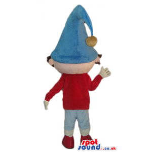 Boy wearing a red sweater, a blue hat, white trousers, red