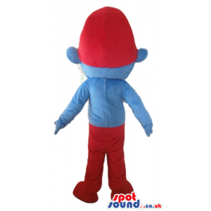 Papa smurf with a white beard, red trousers and a red hat -