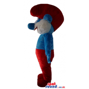 Papa smurf with a white beard, red trousers and a red hat -