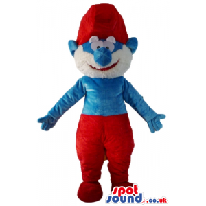 Papa smurf with a white beard, red trousers and a red hat -