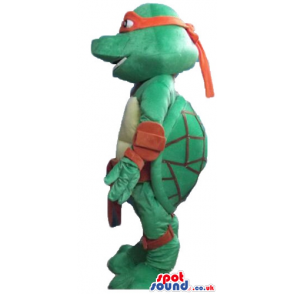 Ninja turtle wearing a red mask around the eyes and a red belt