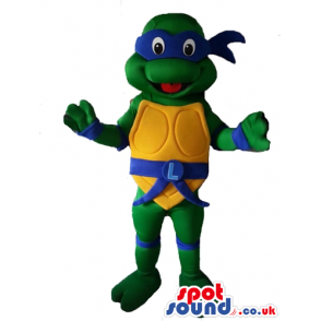 Ninja turtle with a yellow belly wearing a blue mask round the