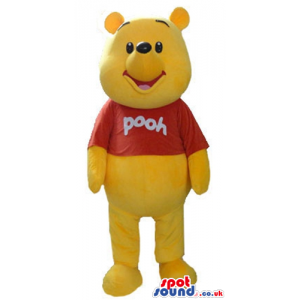 Winnie the pooh wearing a red t-shirt with an inscription -