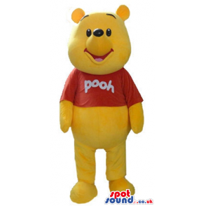 Winnie the pooh wearing a red t-shirt with an inscription -