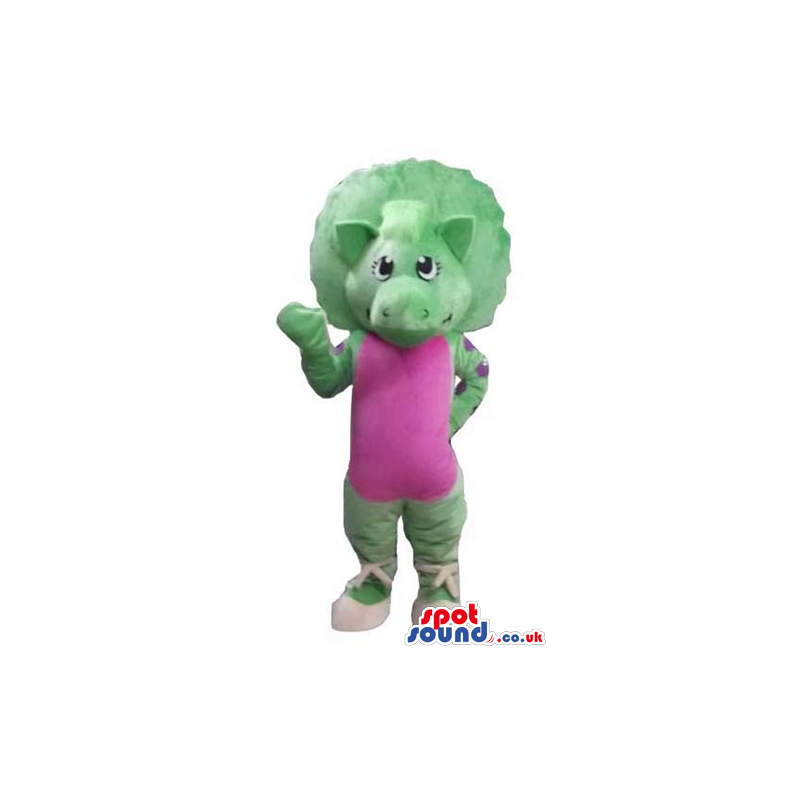 Female green dinosaur wearing a pink maillot and white