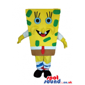 Sponge bob with green dots wearing brown shorts, and a red tie