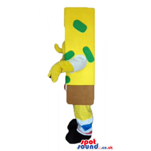 Sponge bob with green dots wearing brown shorts, and a red tie