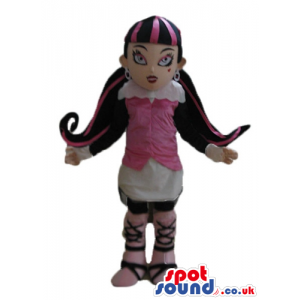 Monster high girl with long pink and black hair, wearing a pink