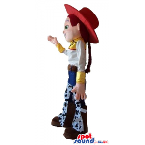 Jessie the cowgirl wearing a red hat, a white shirt, blue