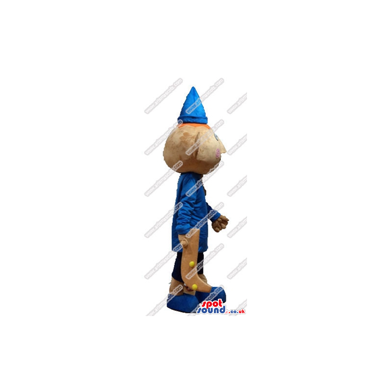 Elf with triangular ears wearing a blue shirt, blacke trousers