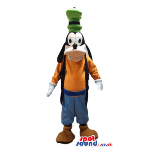 Goofy wearing an orange sweater, a black vest, blue trousers