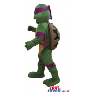 Ninja turtle with a yellow belly, a violet mask round the eyes