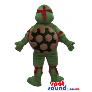 Ninja turtle with a yellow belly, a red mask round the eyes and