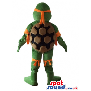 Ninja turtle with a yellow belly, an orange mask round the eyes