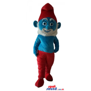 Papa smurf with a white beard, red trousers and a red hat -