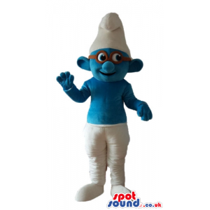 Smiling smurf wearing white trousers and a white hat and brown