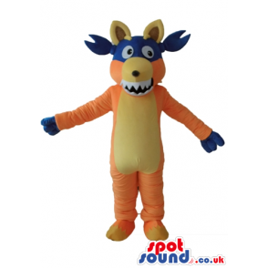 Orange fox with a yellow belly and ears wearing a blue mask