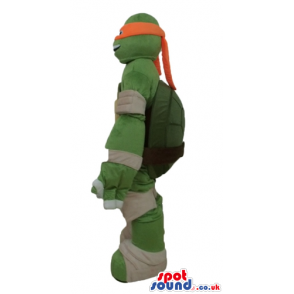 Ninja turtle with an orange mask round the eyes and beige