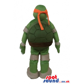 Ninja turtle with an orange mask round the eyes and beige
