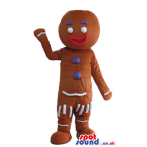 Gingerbread man with a red lace decorated in purple and white -