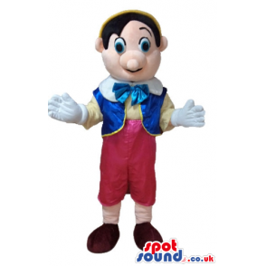 Pinnochio wearing red trousers, a yellow shirt, a blue vest, a