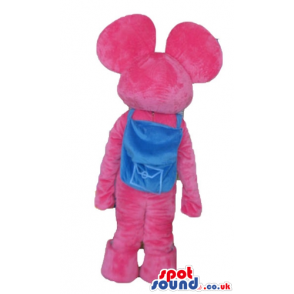Pink furry elephant with black eyes wearing a light-blue school