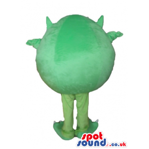 Single-eyed green monster with a huge smile with sharp teeth -
