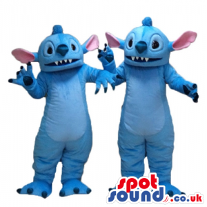 Two light-blue monsters with big light blue and pink ears, big