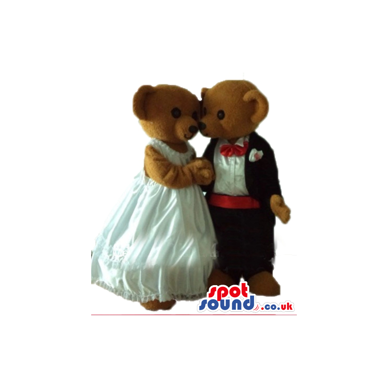 Couple of brown bears wearing a white wedding dress and a black