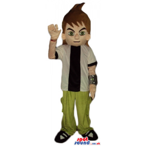 Brown haired boy wearing green trousers, and a black and white