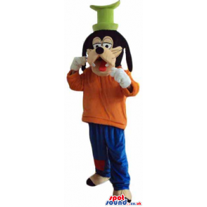 goofy wearing an orange sweater,blue trousers, brown shoes and