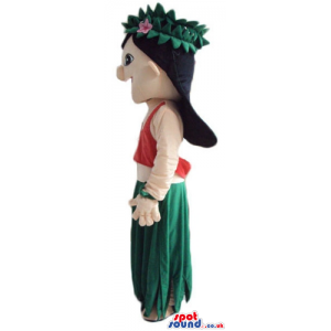 Girl with long black hair wearing a long green dress and a red