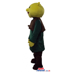 Green monster wearing a black and dark green tunic and black