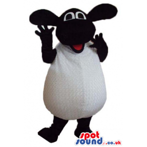 White sheep with black face, arms, legs, hands and feet -