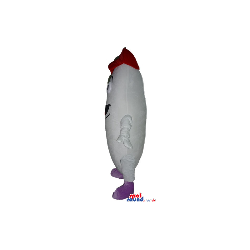 Peeled smiling banana wearing a red cap and purple shoes -