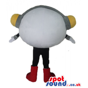 Smiling white ball with black legs and red boots wearing