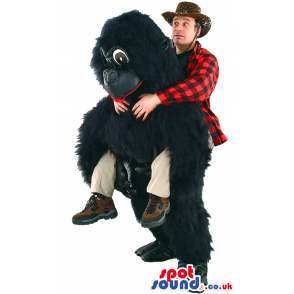 Black Gorilla Mascot With Human Walker On Top And Big Eyes -