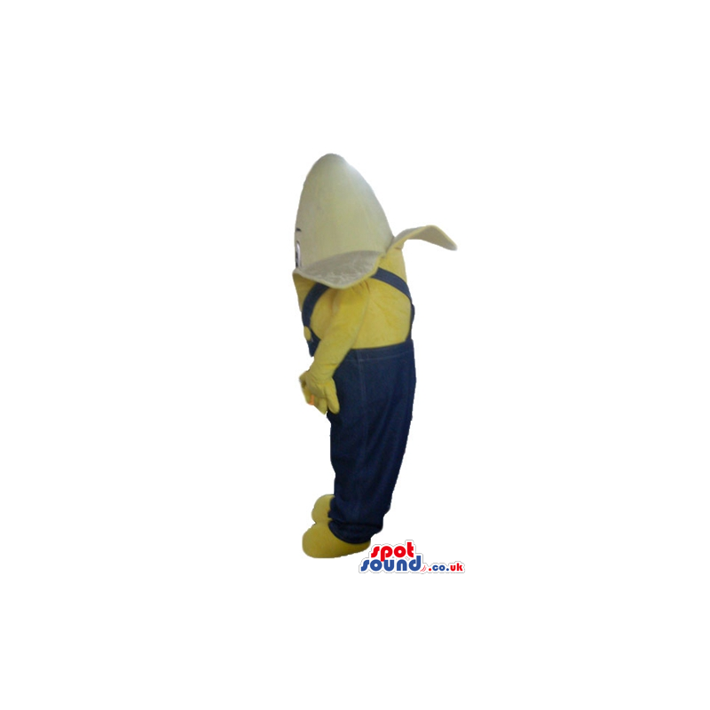 Banana wearing a yellow sweater and blue gardener trousers -