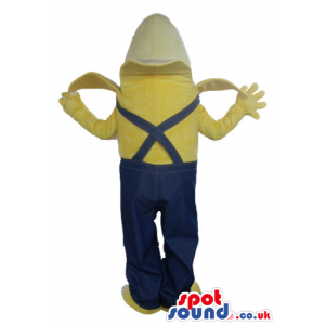Banana wearing a yellow sweater and blue gardener trousers -