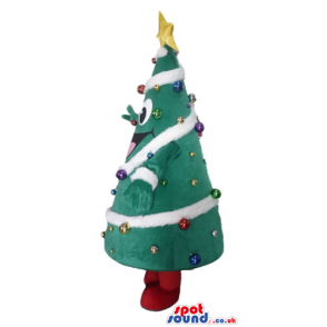 Christmas tree decorated in white, purple and yellow with a