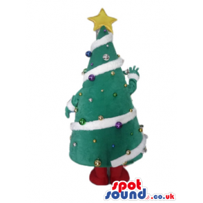 Christmas tree decorated in white, purple and yellow with a