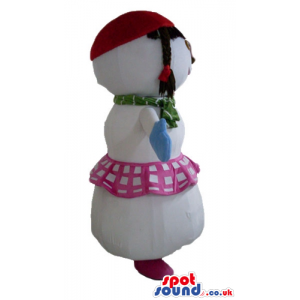 Snow woman with a pink and white skirt, a red hat, light-blue